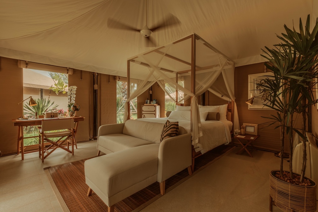 Steps from Bangtao Beach and one of its best beach clubs, this glamping hideaway pairs a romantic canvas suite with direct access to the sand, the bars and the nights out, proof you don't have to choose between switching off and staying in the mix.