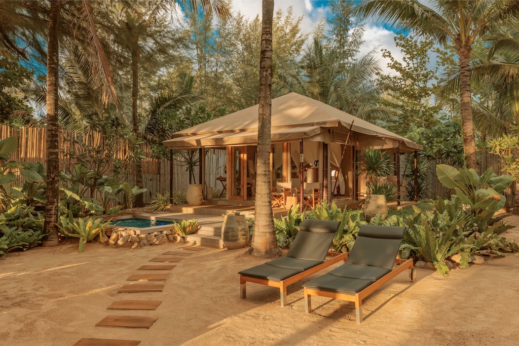 Steps from Bangtao Beach and one of its best beach clubs, this glamping hideaway pairs a romantic canvas suite with direct access to the sand, the bars and the nights out, proof you don't have to choose between switching off and staying in the mix.
