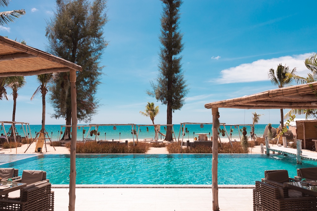 Bang Tao's sunbeds are multiplying, Kamala's gone Ibiza, and Natai's gone quiet-luxury. Here's where Phuket's beach club obsession is actually worth your baht.