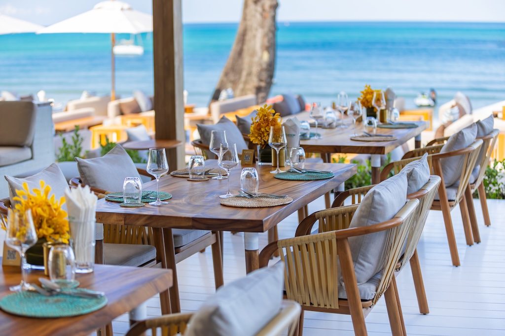 Bang Tao's sunbeds are multiplying, Kamala's gone Ibiza, and Natai's gone quiet-luxury. Here's where Phuket's beach club obsession is actually worth your baht.