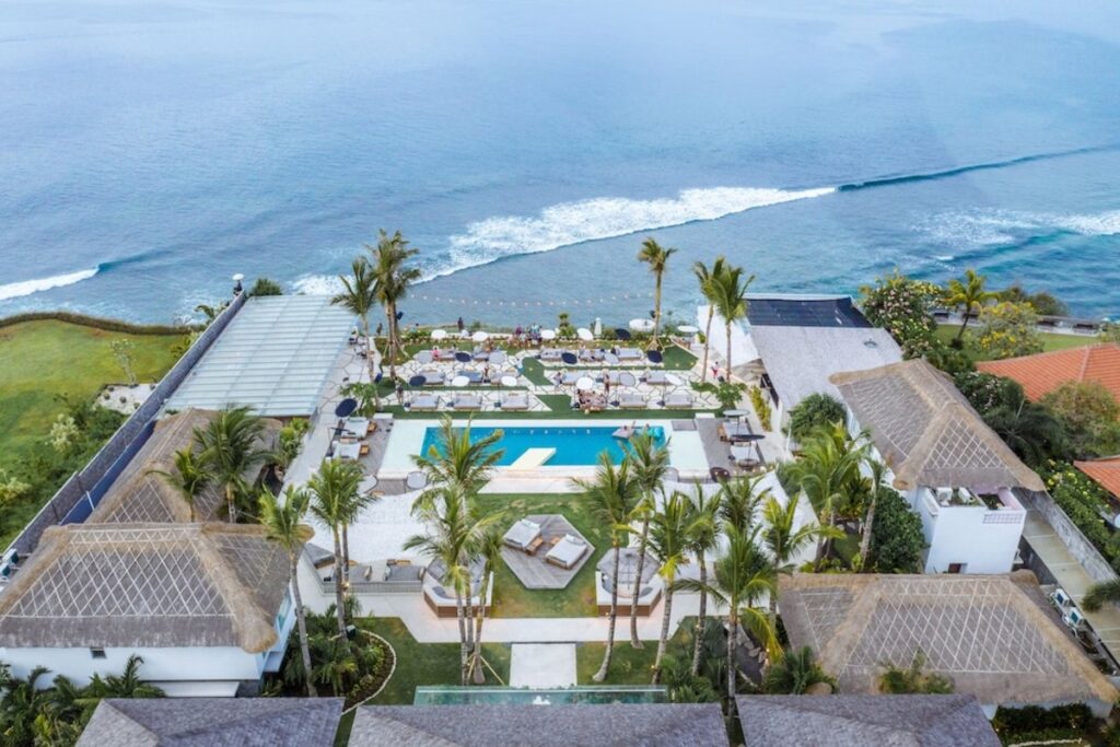 Bali didn't adopt the beach club, it perfected it. Here are the eleven clubs worth building a day around, from Seminyak sand to Uluwatu cliffs.