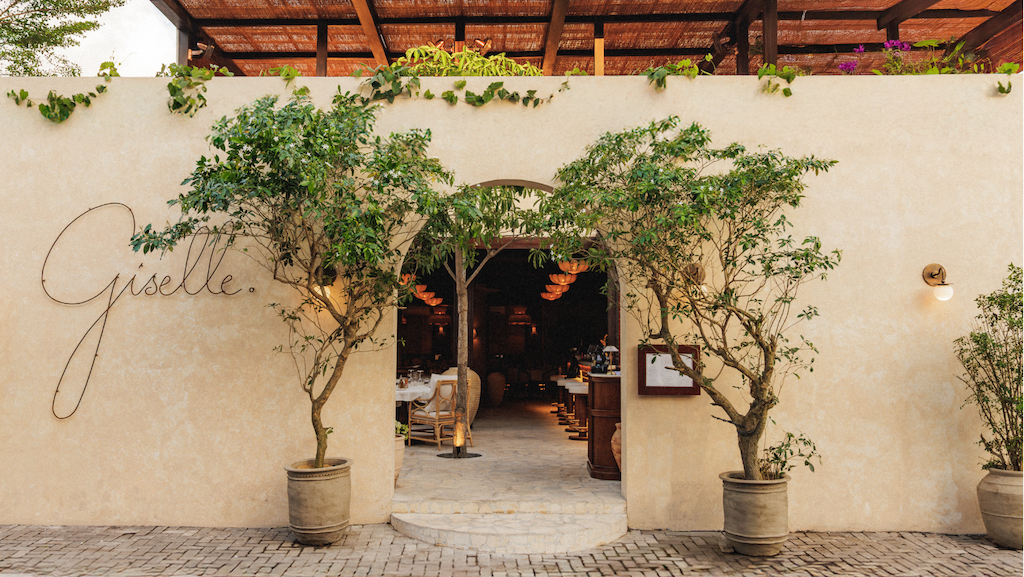 In the heart of Batu Bolong, Giselle reimagines the 1980s Mediterranean Riviera through French-trained cooking, sunlit courtyard design, and an all-night party spirit.