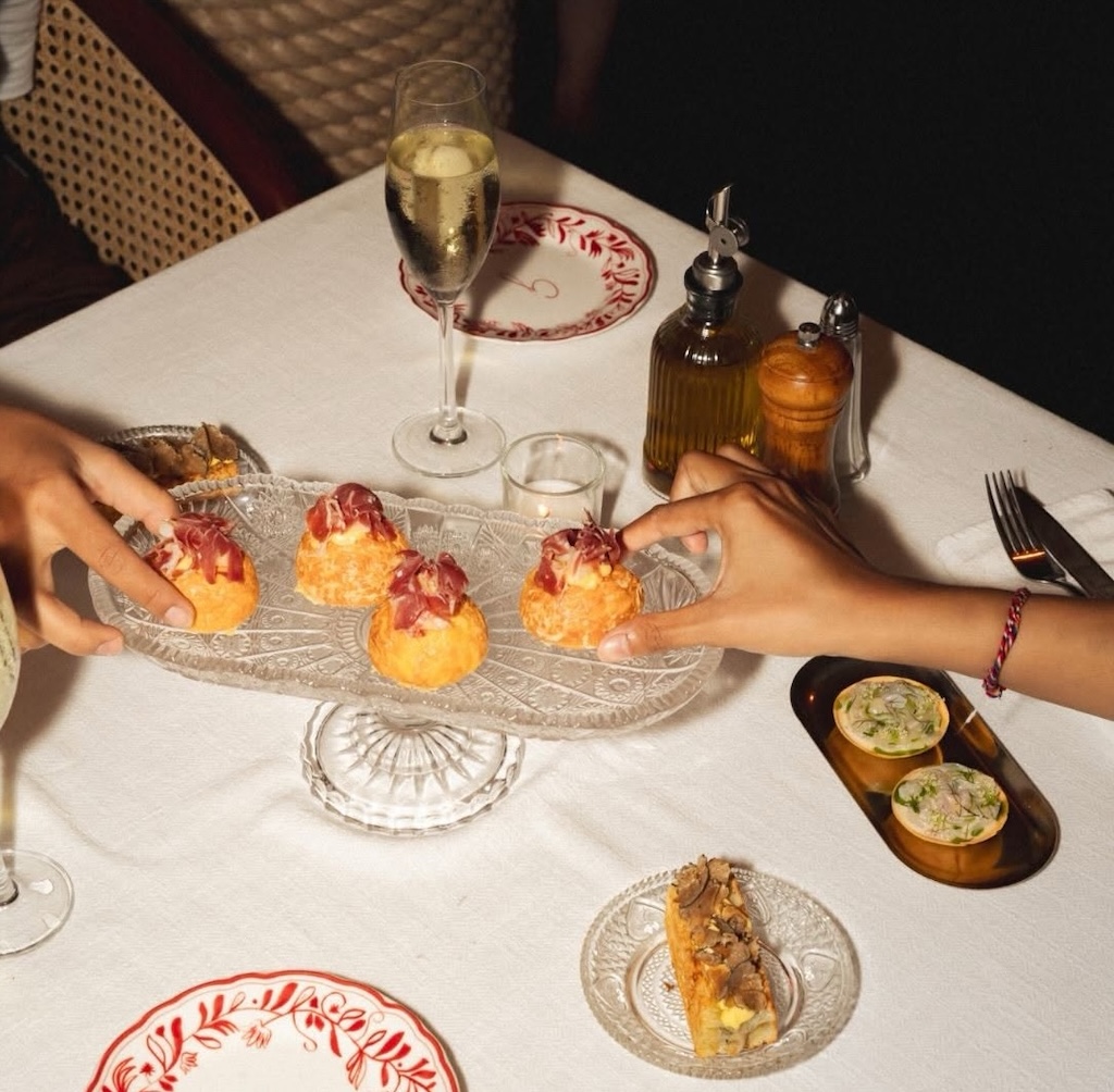 In the heart of Batu Bolong, Giselle reimagines the 1980s Mediterranean Riviera through French-trained cooking, sunlit courtyard design, and an all-night party spirit.