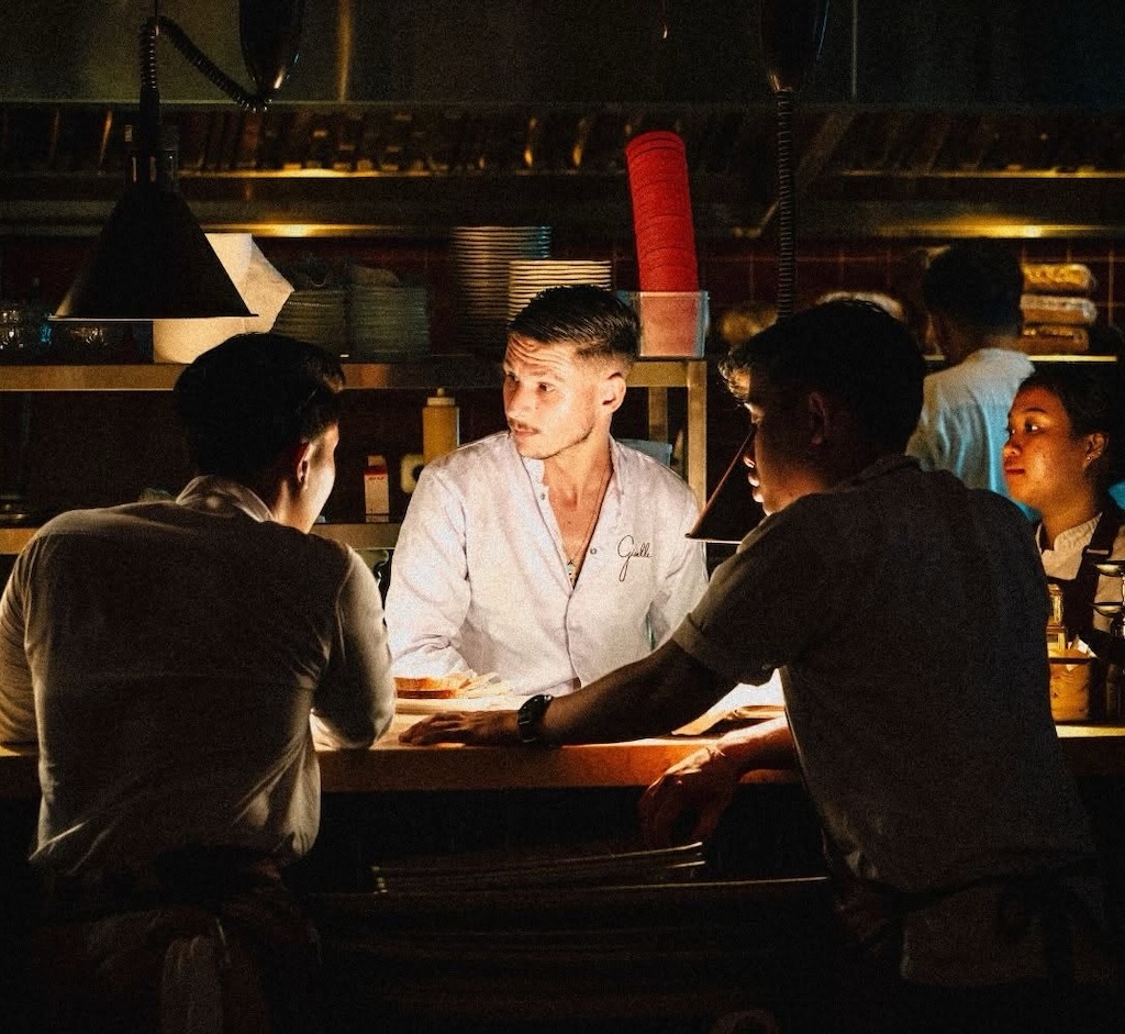 In the heart of Batu Bolong, Giselle reimagines the 1980s Mediterranean Riviera through French-trained cooking, sunlit courtyard design, and an all-night party spirit.