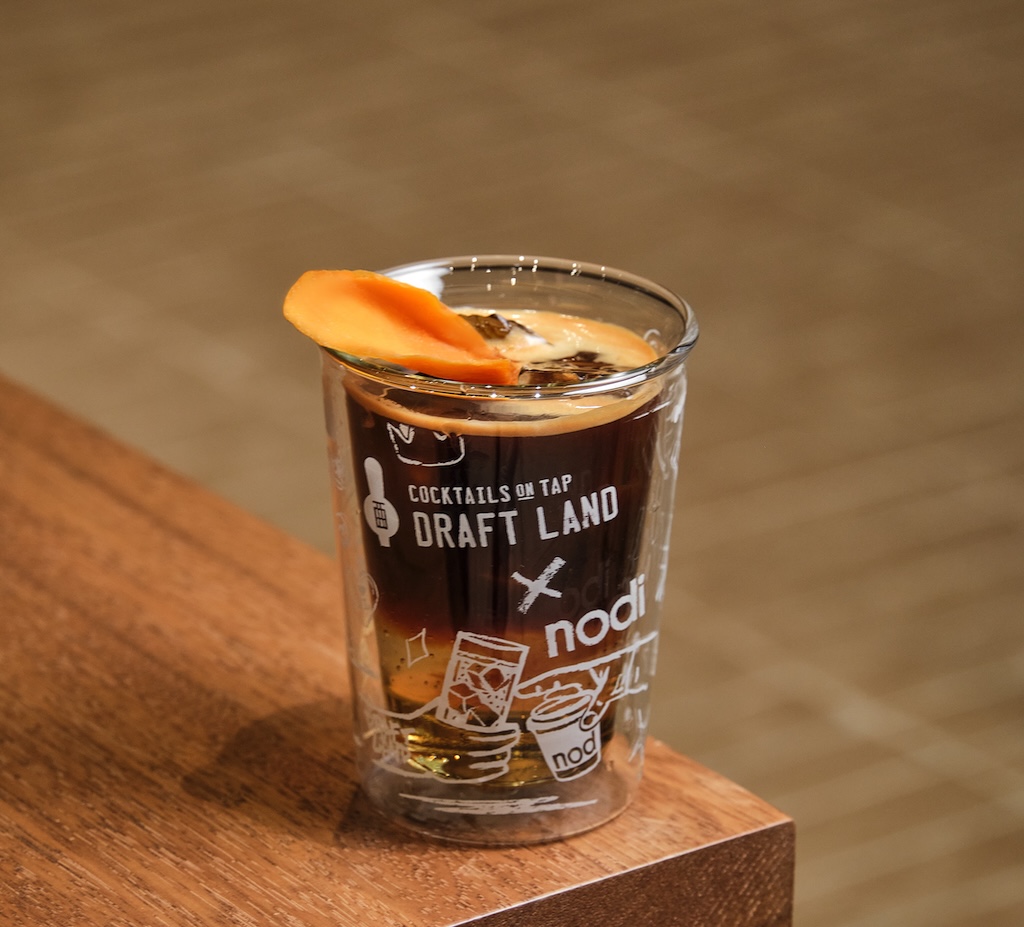 Draft Land HK has opened its first Kowloon outpost in Tsim Sha Tsui, teaming up with nodi coffee for a day-to-night café-cocktail bar experience.