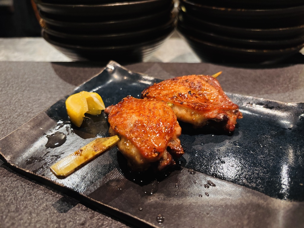 On Sanur's evolving high street, London-born yakitori restaurant Junsei pairs precision-grilled skewers with an intimate room, a vinyl soundtrack, and Tamba's cocktails right next door.
