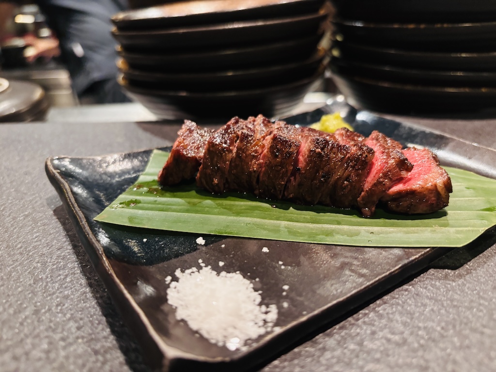 On Sanur's evolving high street, London-born yakitori restaurant Junsei pairs precision-grilled skewers with an intimate room, a vinyl soundtrack, and Tamba's cocktails right next door.
