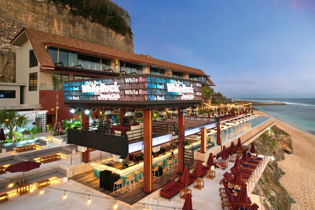 Bali didn't adopt the beach club, it perfected it. Here are the eleven clubs worth building a day around, from Seminyak sand to Uluwatu cliffs.