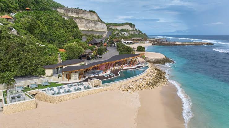 Bali didn't adopt the beach club, it perfected it. Here are the eleven clubs worth building a day around, from Seminyak sand to Uluwatu cliffs.