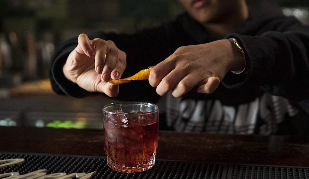 A Florentine count's stronger Americano became the world's favorite bitter classic. Here's the Negroni's history, its global revival, and Asia's finest pours, just in time for Negroni Week.